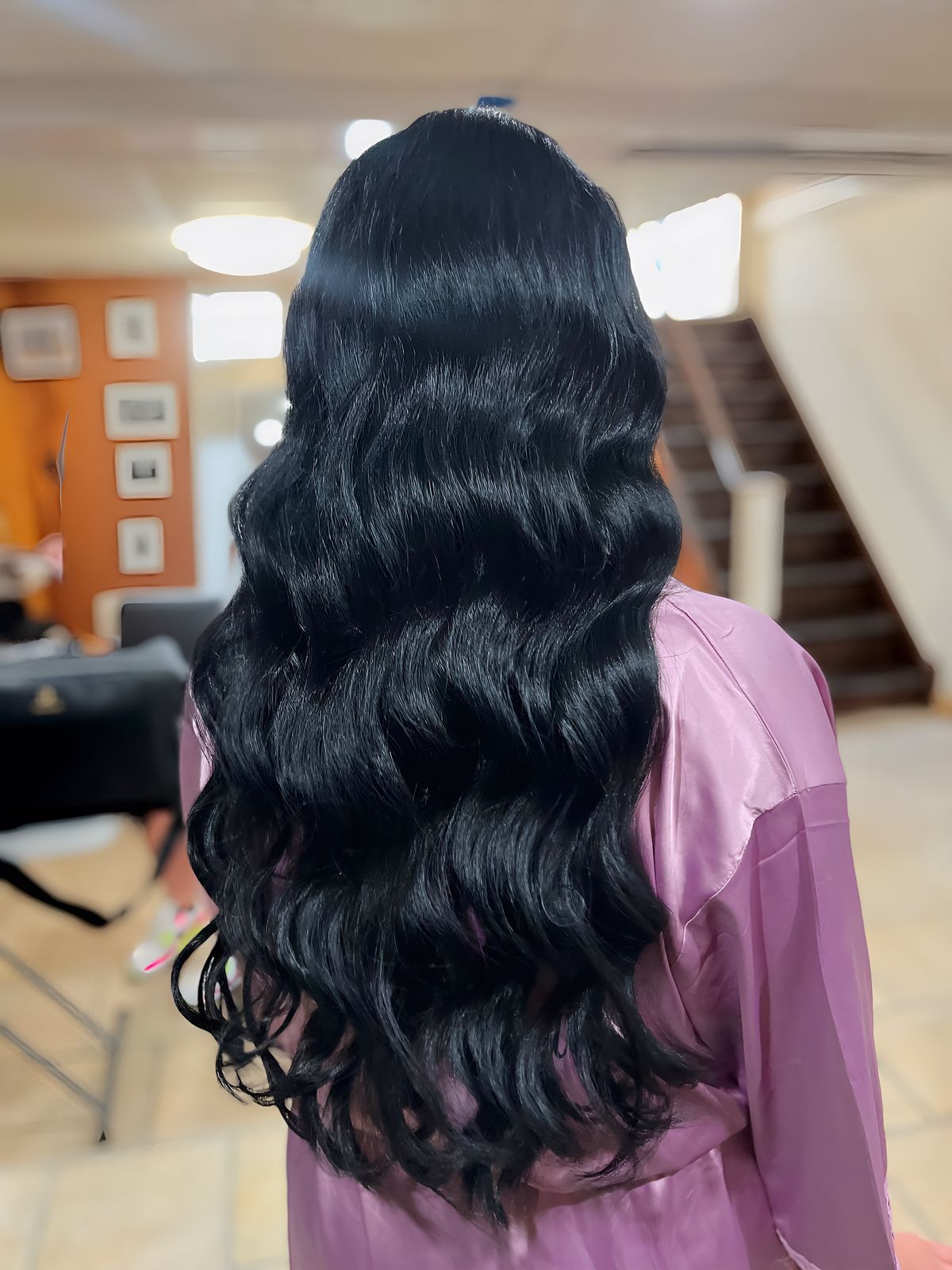 Long glossy black Hollywood waves